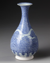 A CHINESE BLUE AND WHITE DRAGON VASE, QING DYNASTY (1644–1911)