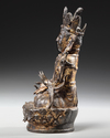 A GILT CHINESE BRONZE FIGURE OF GUANYIN, MING DYNASTY (1368-1644)