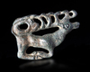 A SCYTHIAN BRONZE APPLIQUE OF A STAG, 600-400 BC