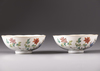 A pair of Chinese famille rose 'butterfly and flower' bowls