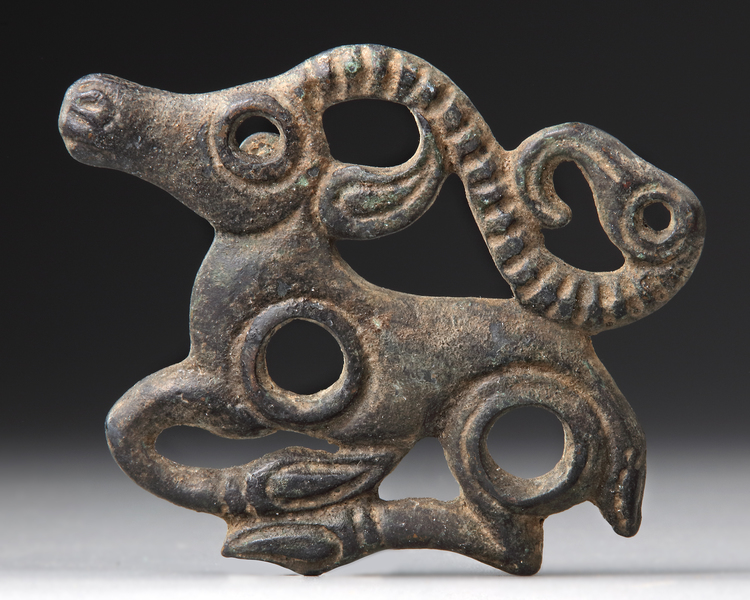 A LARGE SCYTHIAN BRONZE APPLIQUE OF AN ANTELOPE, 600 BC