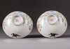 A pair of Chinese famille rose 'butterfly and flower' bowls