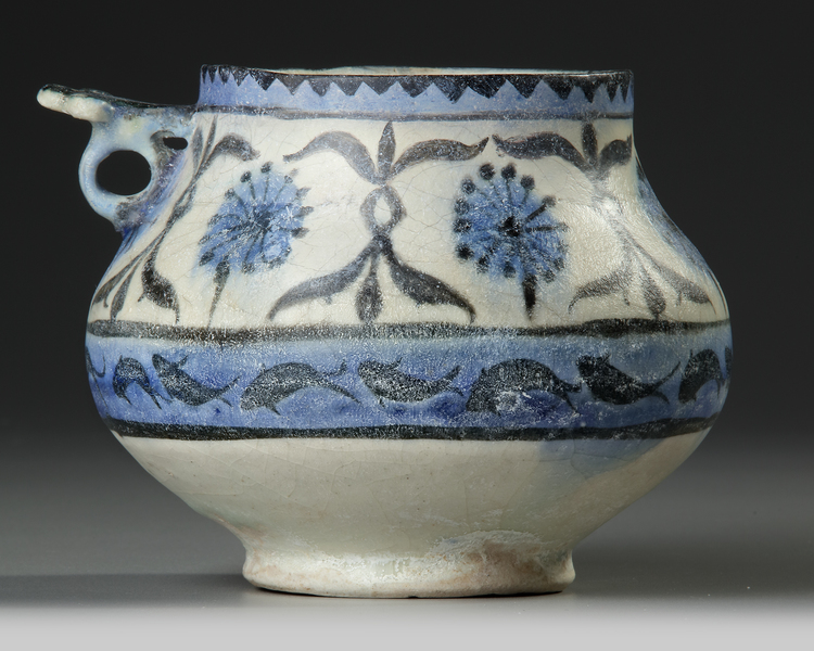 A KASHAN POTTERY JUG, PERSIA, EARLY 13TH CENTURY