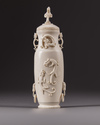 A Chinese ivory ‘chilong’ vase and cover