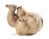 A TERRACOTTA RHYTON/VESSEL IN THE FORM OF A CAMEL, WESTERN PERSIA/CAUCASUS, CIRCA 800 BC