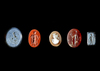 FOUR ROMAN INTAGLIOS AND A LATER CAMEO, 1ST-3RD CENTURY AD, CAMEO 18TH CENTURY AD