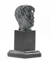 A MINIATURE BRONZE HEAD OF THE EMPEROR HADRIAN, 117-138 AD 2ND CENTURY AD