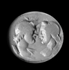A ROMAN CARNELIAN INTAGLIO SHOWING THE BUSTS OF THE DIOSCURI, 1ST CENTURY AD