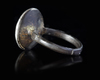 A SELJUK INSCRIBED SILVER RING, PERSIA 11TH-12TH CENTURY