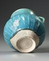 A TURQUOISE BLUE GLAZED POTTERY JUG, PERSIA-KASHAN, 12TH CENTURY