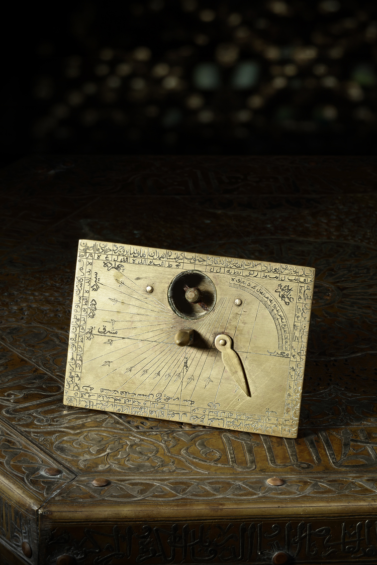 A SAFAVID HORIZONTAL DIAL AND QIBLA INDICATOR, ATTRIBUTED TO “ABD-AL-AIMMAH", PERSIA,