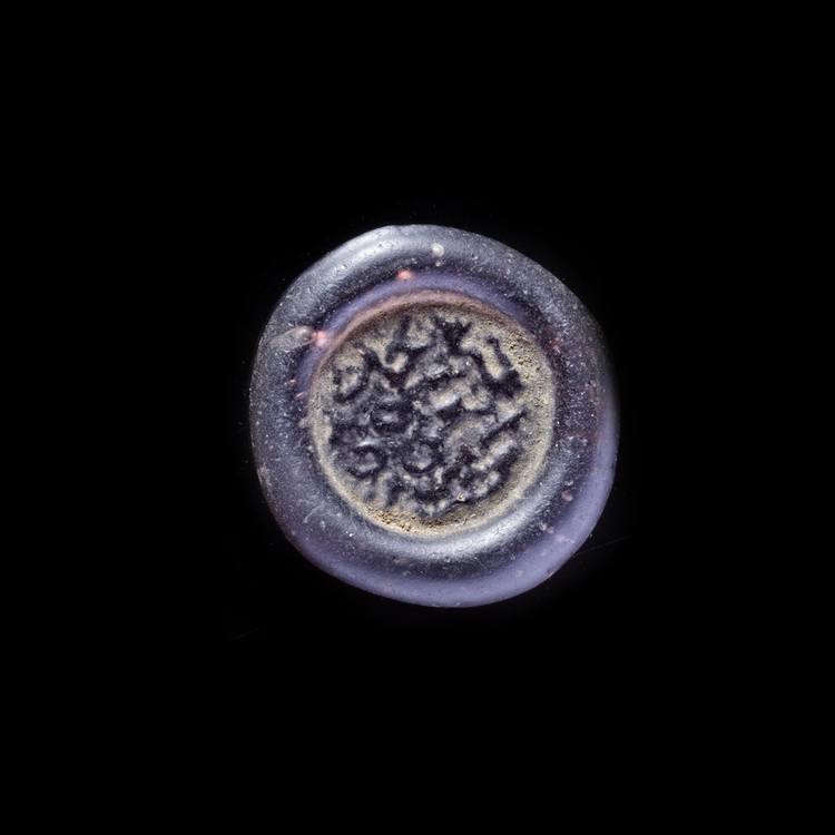 AN EARLY ISLAMIC GLASS WEIGHT OF DOUBLE DIRHAM, 10TH-11TH CENTURY