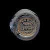 AN EARLY ISLAMIC GLASS WEIGHT OF DOUBLE DINAR,10TH-11TH CENTURY