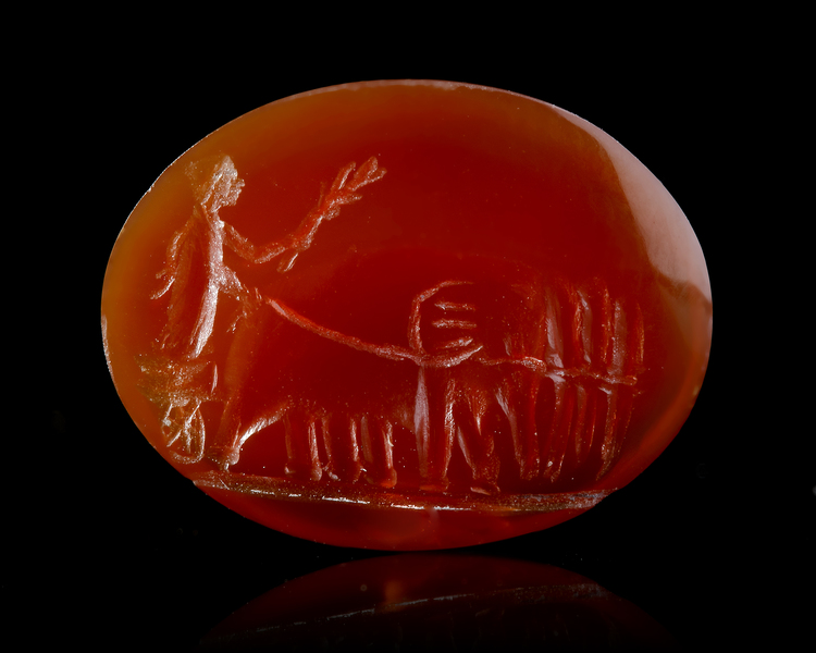 A ROMAN CARNELIAN INTAGLIO WITH AN ELEPHANT QUADRIGA, 1ST CENTURY BC-AD