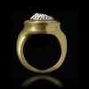 A ROMAN GOLD RING WITH A THREE QUARTERS PORTRAIT OF A CHILD, 1ST/2ND CENTURY AD