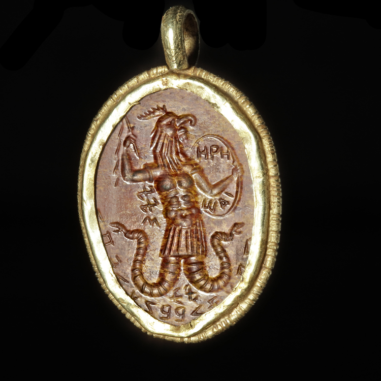 A ROMAN GNOSTIC INTAGLIO SET IN A GOLD MOUNT, 2ND/3RD CENTURY AD