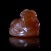 A RECLINING BULL AMULET IN CARNELIAN, EASTERN MEDITERRANEAN, 6TH CENTURY BC