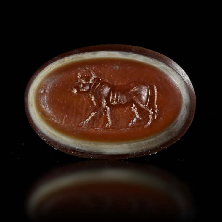 A ROMAN INTAGLIO WITH A WALKING BULL, 1ST CENTURY AD