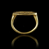 AN ARCHAIC GREEK GOLD RING WITH A BULL, CIRCA LATE 6TH CENTURY BC