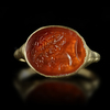 A GOLD RING WITH A CARNELIAN INTAGLIO WITH THE PORTRAIT OF A HELLENISTIC RULER, 2ND/3RD CENTURY BC