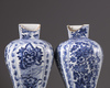 Two Chinese blue and white vases with covers