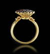 A BYZANTINE GOLD RING SET WITH A GARNET INTAGLIO, 6TH CENTURY AD OR LATER