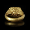 A BYZANTINE GOLD RING WITH A TOPAZ INTAGLIO WITH A BUST OF CHRIST, 6TH/7TH CENTURY AD