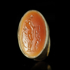 A LATE HELLENISTIC GOLD RING WITH AN INTAGLIO OF APHRODITE/VENUS, 2ND-1ST CENTURY BC