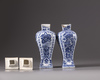 Two Chinese blue and white vases with covers
