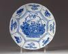 A CHINESE BLUE AND WHITE BARBED RIM 'FLOWER BASKET' DISH, 17TH CENTURY
