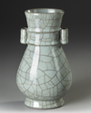A CHINESE GUAN-TYPE HU TWIN-HANDLED VASE, QING DYNASTY (1644-1912)