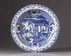 A large Chinese blue and white 'Romance of the Western Chamber' deep dish