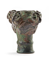 A BRONZE MACE HEAD WITH FOUR RECLINING RAMS, LURISTAN, 10TH-8TH CENTURY BC