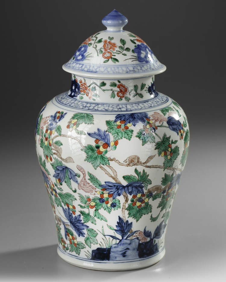 A WUCAI 'SQUIRREL AND GRAPEVINE' JAR AND COVER