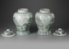 A PAIR OF CHINESE FAMILLE ROSE VASES WITH COVERS, 20TH CENTURY