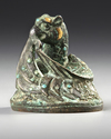 A CHINESE GOLD AND SILVER-INLAID BRONZE FIGURE OF A MYTHICAL BEAST WEIGHT, HAN DYNASTY (206 BC-AD 220) OR LATER
