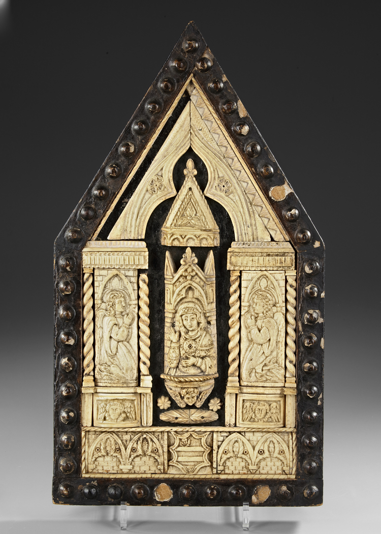 A BONE CARVED WOODEN PANEL OF THE VIRIGN WITH ANGELS