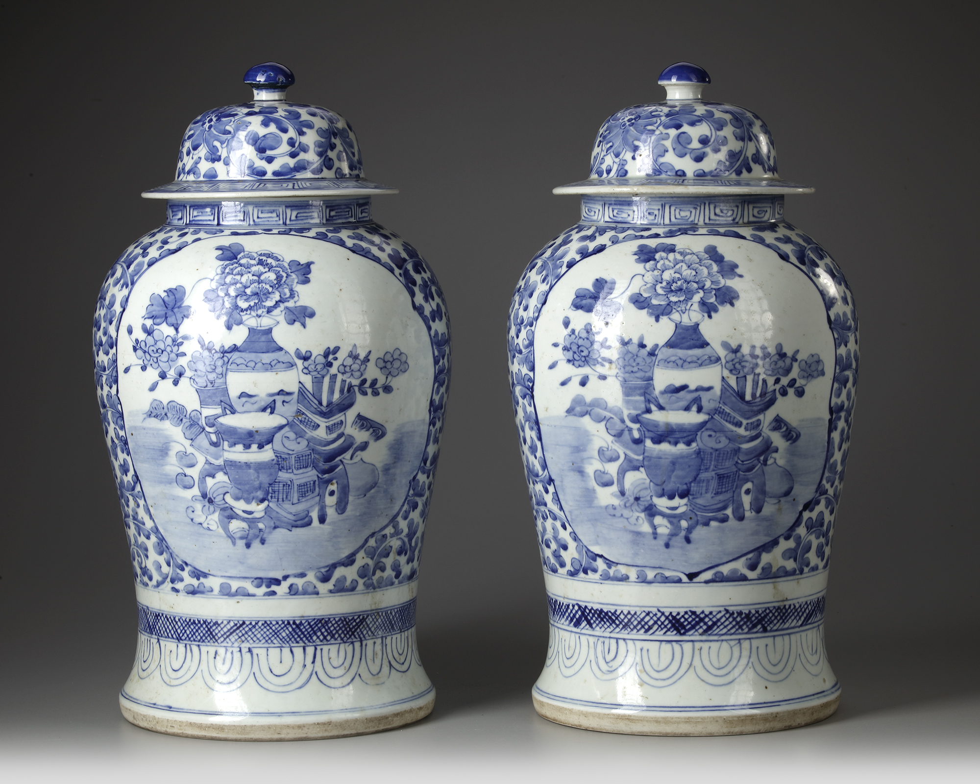 A Pair Of Chinese Blue And White Vases With Covers, Early 20th Century