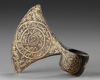 A PERSIAN GILT STEEL AXE HEAD, QAJAR DATED 1325 AH/1907 AD