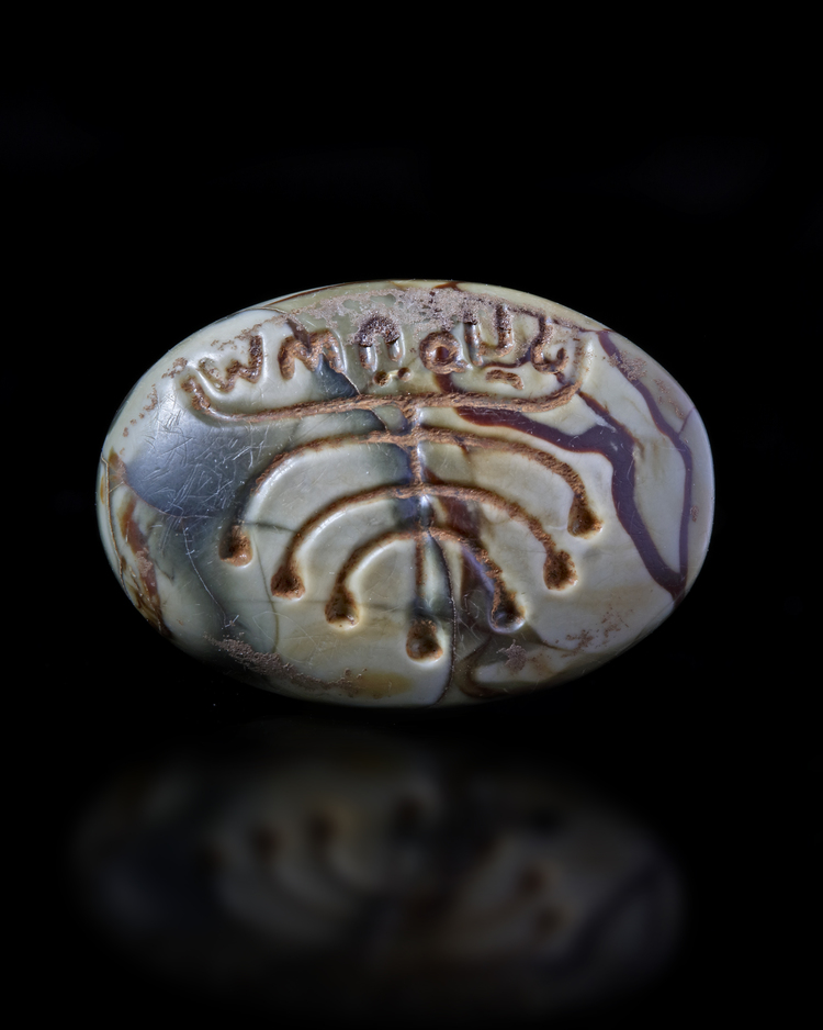AN OVAL AGATE SEAL WITH A MENORAH, 4TH CENTURY BC