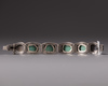 A silver filigree bracelet with Turquoise inlay