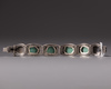 A silver filigree bracelet with Turquoise inlay