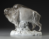 A PORCELAIN SCULPTURE OF A BISON, 20TH CENTURY