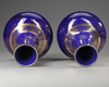 A PAIR OF CHINESE GILT POWDER-BLUE  BOTTLE VASES, LATE 19TH-EARLY 20TH CENTURY