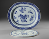 A CHINESE BLUE AND WHITE SERVING PLATTER WITH A STRAINER, 18TH CENTURY
