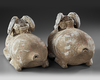 A PAIR OF TERRACOTTA VESSELS IN THE FORM OF A RAM, HAN DYNASTY (206 BC-220 AD)