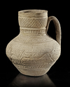 A SELJUK POTTERY UNGLAZED JUG, PERSIA, 12TH CENTURY