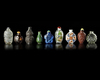 A COLLECTION OF 9 SNUFF BOTTLES IN VARIOUS MATERIALS, QING DYNASTY (1644-1911)