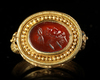 A LARGE GOLD RING IN THE STYLE OF THE ANTIQUE, 19TH CENTURY AD