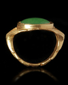 A ROMAN STYLE GOLD RING WITH A GREEN STONE, 3RD-4TH CENTURY AD OR LATER